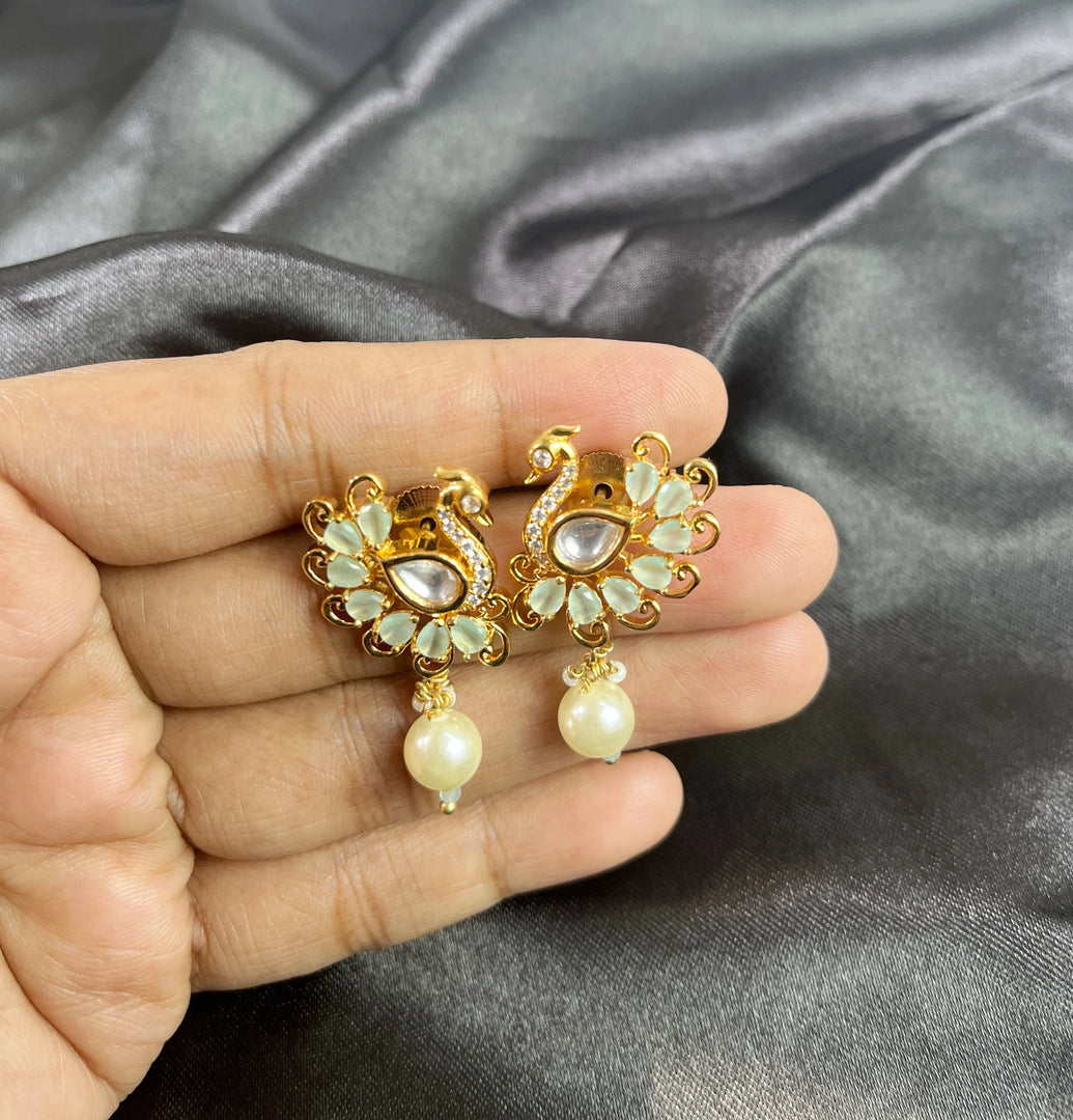 Ivory Peacock Drops